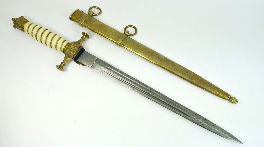 Imperial sea cortex with a damascus steel blade.