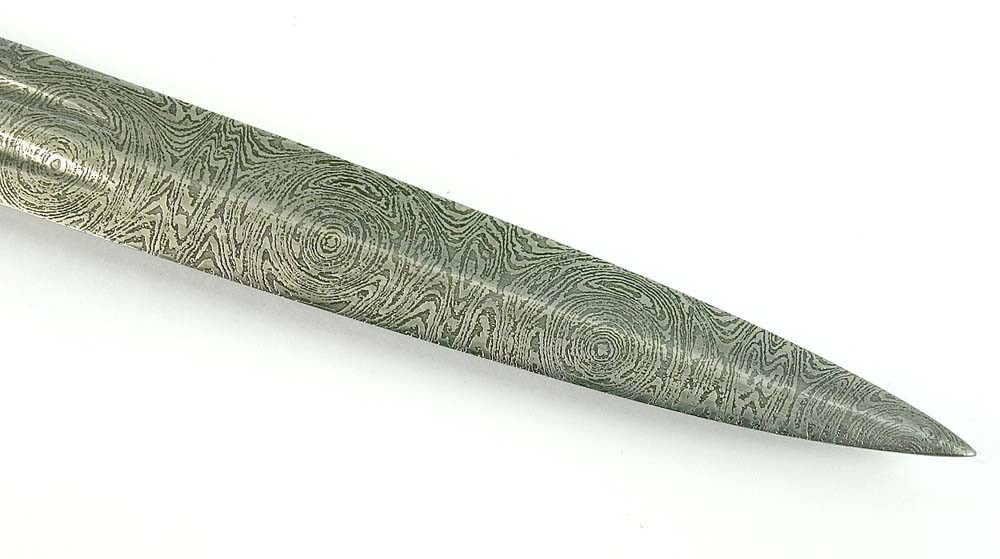 Imperial sea cortex with a damascus steel blade.